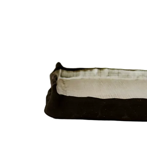 Black and beige fabric swatch on a white background